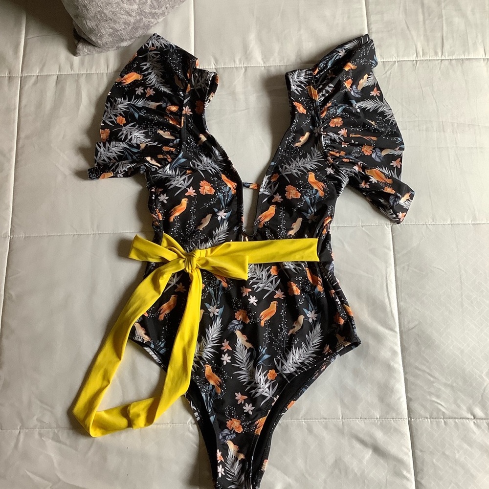 Swimming suit, with sleeves, tropical pattern, with bow